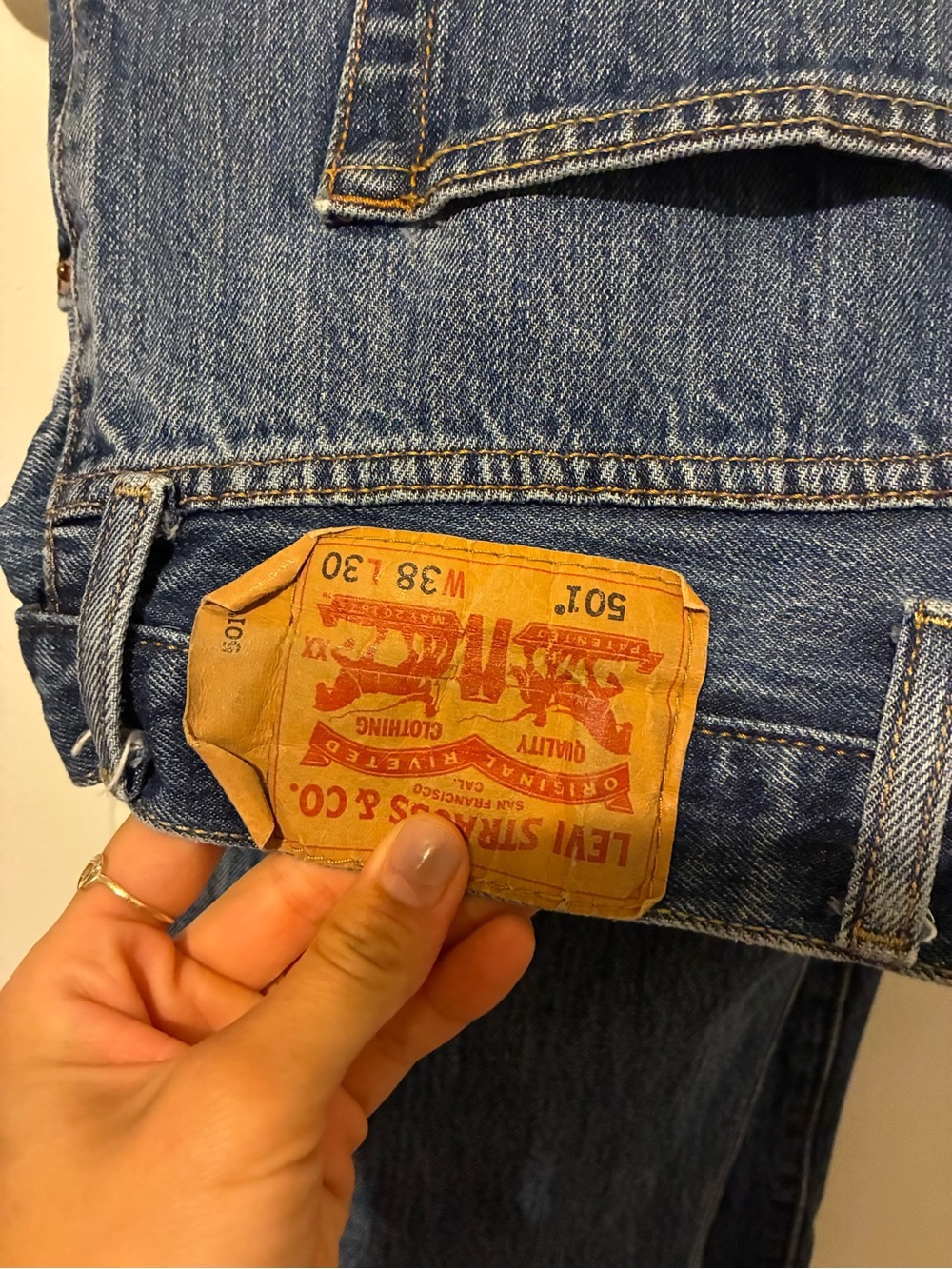 Levi's blue denim jeans with tan leather patch